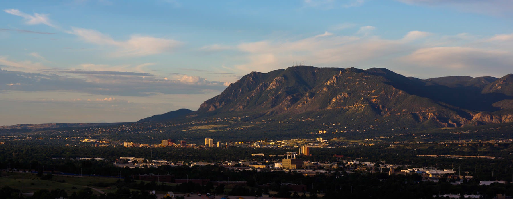 city at the foothills of mountain range